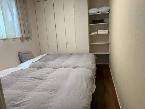 Postel nebo postele na pokoji v ubytování Maizon de Aile Room D