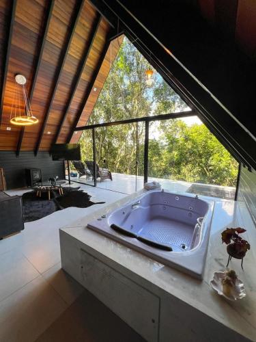 Ένα ή περισσότερα κρεβάτια σε δωμάτιο στο Cabanas do Valle
