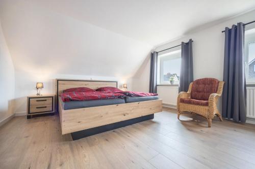 Ένα ή περισσότερα κρεβάτια σε δωμάτιο στο Ferienhaus Inge