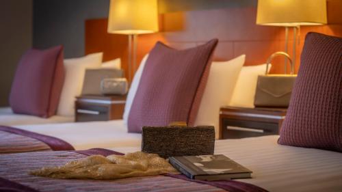 Ένα ή περισσότερα κρεβάτια σε δωμάτιο στο Killarney Flesk River Apartments