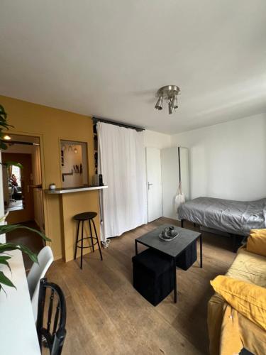 Posezení v ubytování Studio : coeur de Boulogne