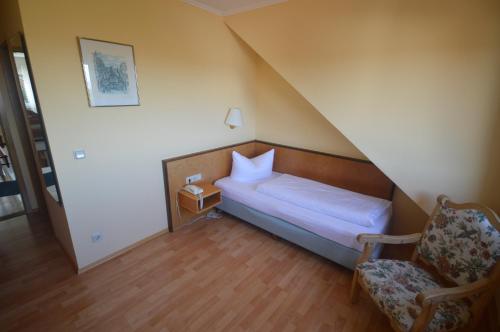 Zur Burgruine Frauenberg tesisinde bir odada yatak veya yataklar