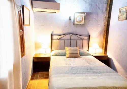 Postelja oz. postelje v sobi nastanitve 5 bedrooms villa with private pool furnished terrace and wifi at Archena