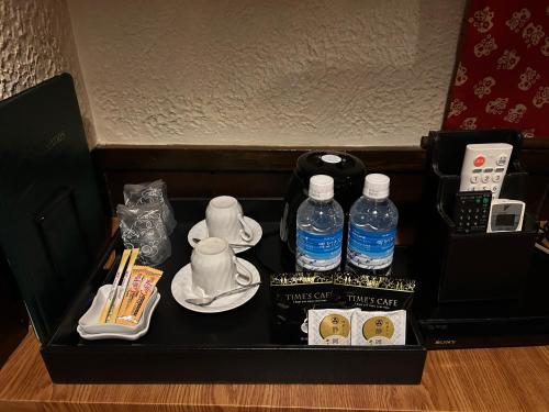 a box with two bottles of water and other items at ホテルアイエス in Yokohama