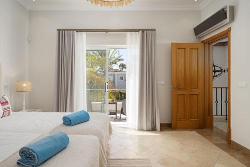 Ένα ή περισσότερα κρεβάτια σε δωμάτιο στο Villa Flamingo - Quinta do Mar