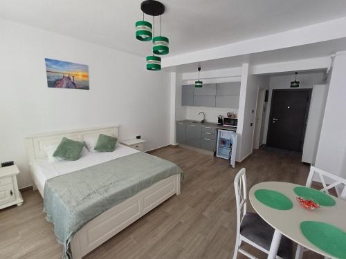 En eller flere senge i et værelse på Sunrise MV 14