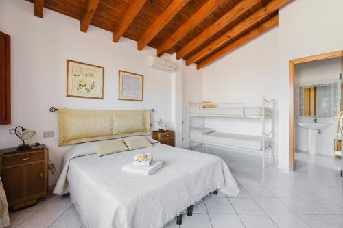 Postel nebo postele na pokoji v ubytování Il Corbezzolo