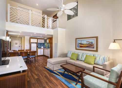 a living room with a couch and a table at Margaritaville Vacation Club by Wyndham - St Thomas in Frydendal
