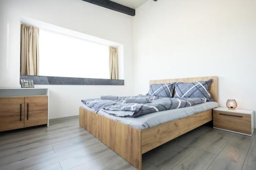 Postel nebo postele na pokoji v ubytování Panorama Residence