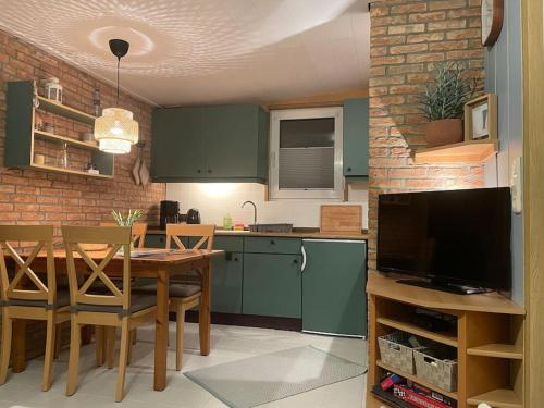 Dapur atau dapur kecil di Hon70pj kleines Ferienhaus in Ouddorp