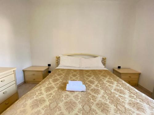Łóżko lub łóżka w pokoju w obiekcie Bisceglie at home