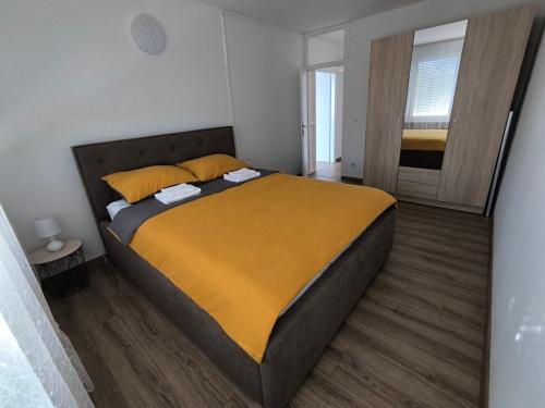Ένα ή περισσότερα κρεβάτια σε δωμάτιο στο Apartman ANJA