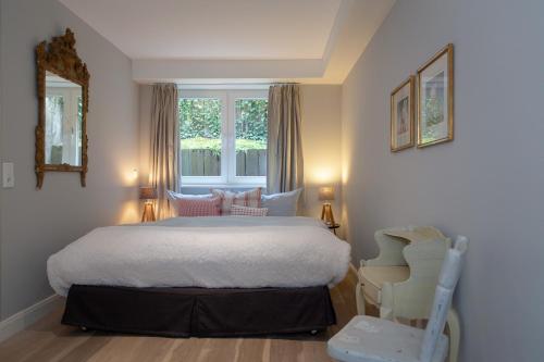 Кровать или кровати в номере Uhlenhorst