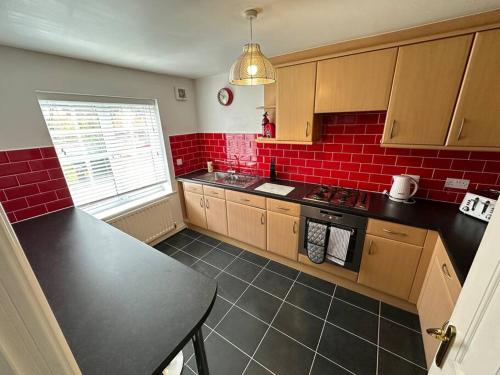 Kuchyň nebo kuchyňský kout v ubytování Mmc serviced accommodation 2