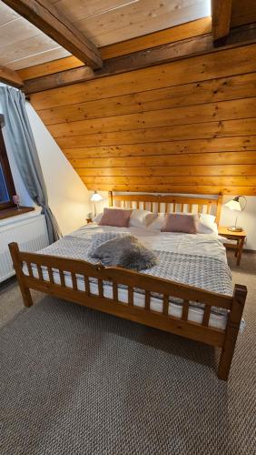 Postel nebo postele na pokoji v ubytování Apartmány Horský Dvůr