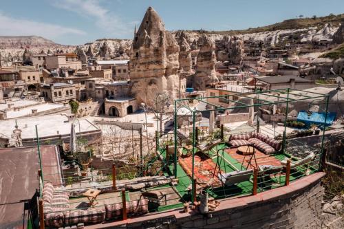 a view of a city with a mountain at Vintage Cave House Hotel in Göreme