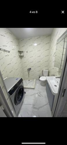 Ванная комната в Tamar Mefi Street 1