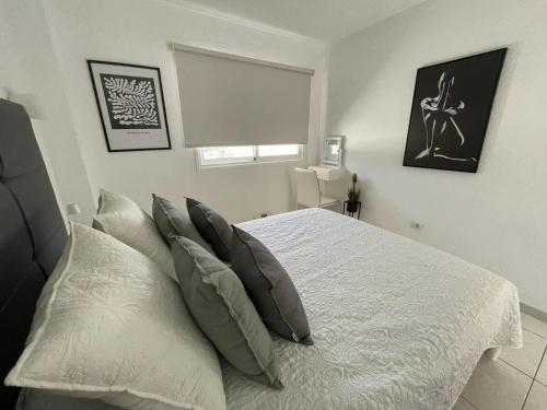 Ένα ή περισσότερα κρεβάτια σε δωμάτιο στο Comodoro 7 - One Bed