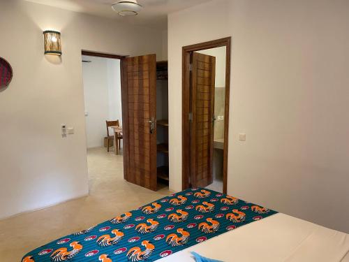Voodi või voodid majutusasutuse Sand Beach Boutique Hotel toas