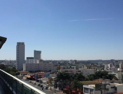 a view of a city from a balcony at Abbas Hotel in Uberlândia