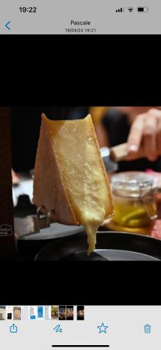 a piece of cheese cake sitting on a table at Miss cocotte champêtre in Gesves