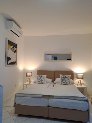 Postel nebo postele na pokoji v ubytování Accommodation Zara