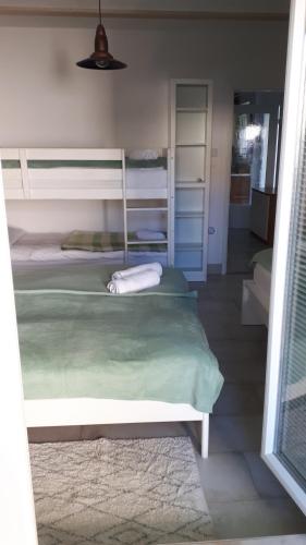 Letto o letti in una camera di Helena