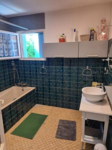 Kúpeľňa v ubytovaní Villa Oleronaise
