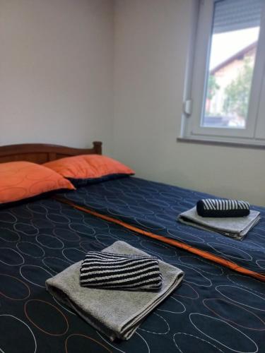 Cama o camas de una habitación en Apartman Dženeta