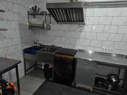 Η κουζίνα ή μικρή κουζίνα στο Perfecthotel