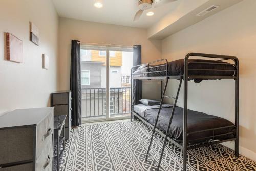 a bedroom with bunk beds and a balcony at Park City Modern New Park City Townhome in Park City