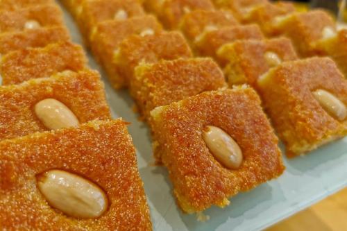 a bunch of waffle holes on a white plate at Hanan petra House 