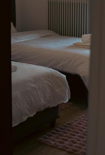 Ένα ή περισσότερα κρεβάτια σε δωμάτιο στο Emily Apartment 5
