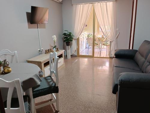 Et tv og/eller underholdning på Apartamento piscina Santa Pola