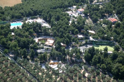 an aerial view of a town with houses and trees at Villaggio Elisena in Vieste