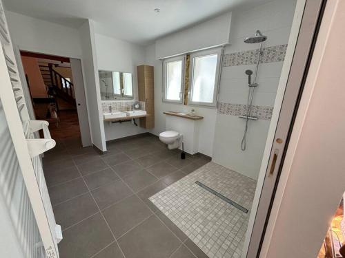 Koupelna v ubytování Maison bord de mer