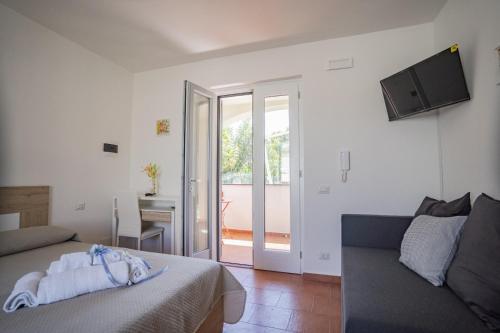 Postel nebo postele na pokoji v ubytování Casa Mimi