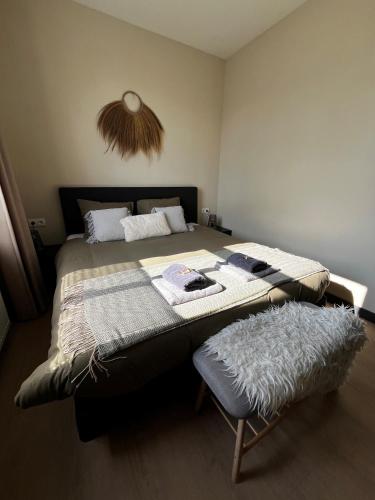 Кровать или кровати в номере B&B de Blauwververij