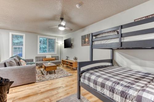 a bedroom with a bunk bed and a living room at Mt Air Unit 4 · At the base of Mt Hood, family suite 4 in Mount Hood Village