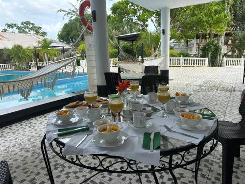 La alberca dentro o cerca de Casa de Campo Hotel Majestic Yurimaguas