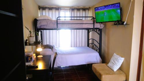 Gallery image of Habitacion con dos camas dobles y baño propio in Puebla