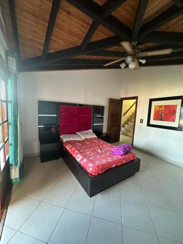 מיטה או מיטות בחדר ב-Villa Isabela
