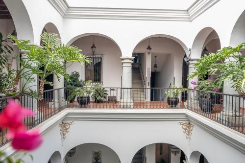 a view of therium of a building with plants at Hotel Boutique Naura Centro in Oaxaca City