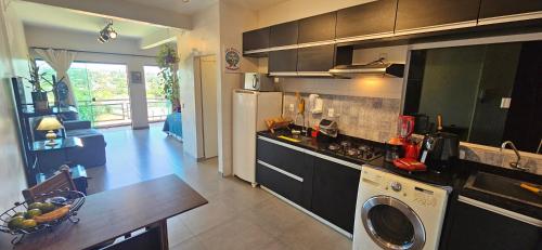 Virtuvė arba virtuvėlė apgyvendinimo įstaigoje Loft do Polo - Conforto e excelente localização