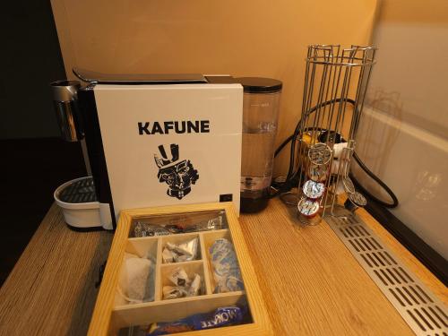 a box sitting on top of a counter with food at PREMIUM APARTMAN ELENI ROOMS,oaza mira i tisine u centru Vrnjacke banje in Vrnjačka Banja