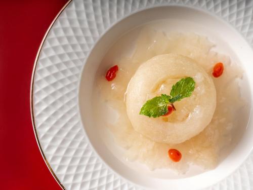 a plate of food with rice andilantro on it at InterContinental Chiang Mai The Mae Ping in Chiang Mai