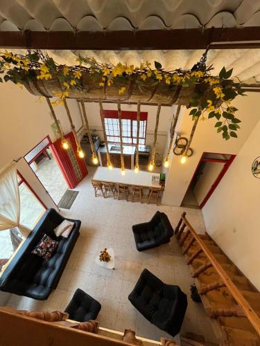 an overhead view of a living room with couches and tables at Villa Ocampo in Salento