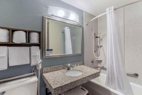 a bathroom with a sink and a shower at Quality Inn Cookeville in Cookeville