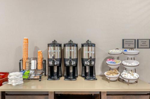 a table with a group of food items on it at Country Inn & Suites by Radisson, Charlottesville-UVA, VA in Charlottesville