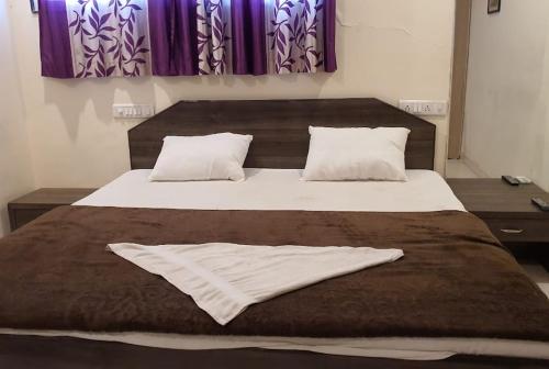 Φωτογραφία από το άλμπουμ του Hotel O Blue Inn σε Vagholi